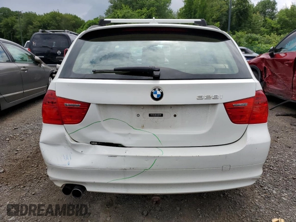 2011 BMW 3 Series 328i xDrive with VIN WBAUU3C5XBA542974, listed as a Copart auction lot 63331535 with 276,912 mi miles and Salvage title. Bid and sale history available at DreamBid. Image 6.