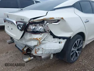 2016 Nissan Maxima SL with VIN 1N4AA6AP6GC431070, listed as a IAAI auction lot 42003568 with 99,748 mi miles and . Bid and sale history available at DreamBid. Image 6.