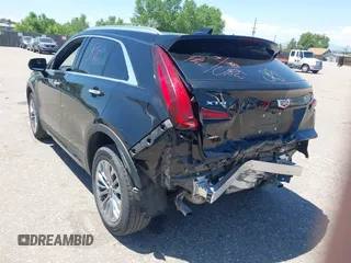 2024 Cadillac XT4 AWD Premium Luxury z VIN 1GYFZDR44RF144801, wystawiony jako IAAI lot #42646613 z przebiegiem 37 358 mil mil oraz . Historia ofert i sprzedaży dostępna na DreamBid. Obrazek 3.