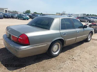 2002 Mercury Grand Marquis LS Premium z VIN 2MEFM75W22X617584, wystawiony jako IAAI lot #42444579 z przebiegiem 199 914 mil mil oraz . Historia ofert i sprzedaży dostępna na DreamBid. Obrazek 4.