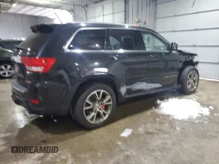 2012 Jeep Grand Cherokee SRT8 with VIN 1C4RJFDJ7CC187475, listed as a Copart auction lot 45191285 with 133,748 mi miles and Salvage Title. Bid and sale history available at carsss.com. Image 3.
