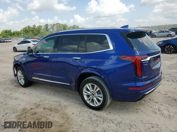 2023 Cadillac XT6 FWD Luxury с VIN 1GYKPAR42PZ167668, выставлен на аукционе Copart как лот 62093575 с пробегом 32 212 миль миль и Списание • Salvage title. История ставок и продаж доступна на DreamBid. Изображение 2.