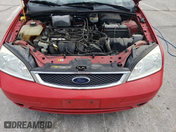 2007 Ford Focus S z VIN 1FAHP37N47W245222, wystawiony jako Copart lot #57293025 z przebiegiem 102 552 mil mil oraz Szkoda całkowita • Salvage title. Historia ofert i sprzedaży dostępna na DreamBid. Obrazek 11.