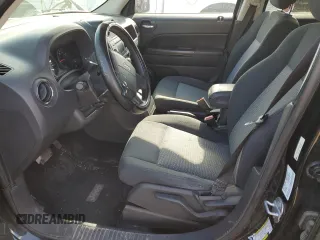 2010 Jeep Patriot Sport with VIN 1J4NF2GB8AD519311, listed as a Copart auction lot 53799085 with 203,762 mi miles and Salvage Title. Bid and sale history available at carsss.com. Image 7.