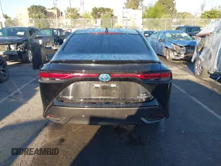 2022 Toyota Mirai XLE with VIN JTDAAAAA9NA007013, listed as a IAAI auction lot 41744965 with 23,243 mi miles and . Bid and sale history available at DreamBid. Image 16.