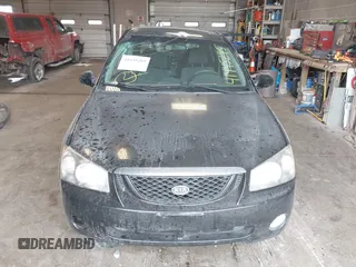 2005 Kia Spectra with VIN KNAFE161255083357, listed as a IAAI auction lot 41445285 with 90,349 mi miles. Bid and sale history available at carsss.com. Image 13.