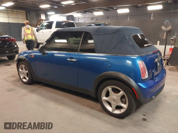 2005 MINI Convertible with VIN WMWRF33555TF63632, listed as a IAAI auction lot 42166640 with 102,559 mi miles and . Bid and sale history available at DreamBid. Image 3.