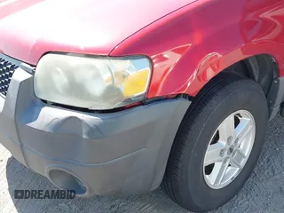 2006 Ford Escape XLS z VIN 1FMYU02Z96KA47068, wystawiony jako IAAI lot #42588037 z przebiegiem 139 581 mil mil oraz . Historia ofert i sprzedaży dostępna na DreamBid. Obrazek 6.
