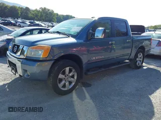 2011 Nissan Titan SL with VIN 1N6AA0EC7BN310833, listed as a IAAI auction lot 40140349 with 230,235 mi miles. Bid and sale history available at carsss.com. Image 2.