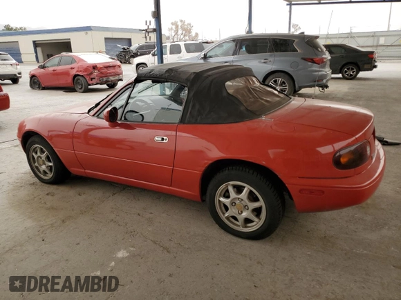 1994 Mazda MX-5 Miata with VIN JM1NA353XR0506259, listed as a Copart auction lot 47587295 with 209,443 mi miles and Salvage title. Bid and sale history available at DreamBid. Image 2.