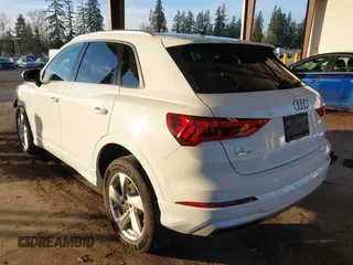 2021 Audi Q3 Premium with VIN WA1AUCF37M1087692, listed as a IAAI auction lot 41277380 with 66,039 mi miles and . Bid and sale history available at DreamBid. Image 3.