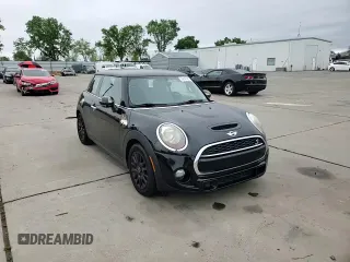 2014 MINI Hardtop S with VIN WMWXM7C57ET987069, listed as a Copart auction lot 52147955 with 121,276 mi miles and Salvage Title. Bid and sale history available at DreamBid. Image 10.