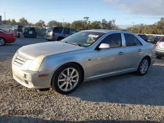 2006 Cadillac STS with VIN 1G6DC67A660100500, listed as a Copart auction lot 80444394 with 116,171 mi miles and Salvage Title. Bid and sale history available at DreamBid. Image 1.