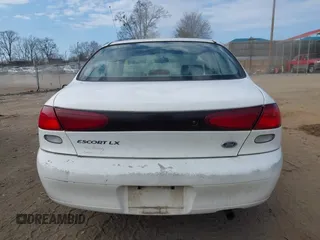 1998 Ford Escort LX с VIN 1FAFP10P5WW144759, выставлен на аукционе IAAI как лот 41519243 с пробегом 115 979 миль миль и . История ставок и продаж доступна на DreamBid. Изображение 12.