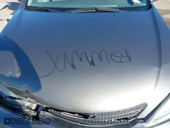 2004 Toyota Camry LE with VIN 4T1BF30K94U577260, listed as a IAAI auction lot 41906287 with 68,499 mi miles. Bid and sale history available at carsss.com. Image 10.
