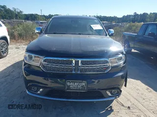 2014 Dodge Durango Citadel with VIN 1C4SDJETXEC390326, listed as a IAAI auction lot 40620779 with 119,537 mi miles and . Bid and sale history available at DreamBid. Image 12.