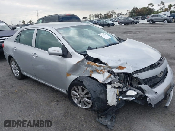 2010 Toyota Corolla with VIN 1NXBU4EE4AZ179951, listed as a IAAI auction lot 42136926 with 148,383 mi miles. Bid and sale history available at carsss.com. Image 1.
