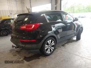 2012 Kia Sportage EX with VIN KNDPCCA2XC7311504, listed as a IAAI auction lot 42330710 with 170,638 mi miles and . Bid and sale history available at DreamBid. Image 4.