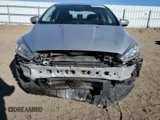 2016 Ford Focus SE with VIN 1FADP3F24GL348258, listed as a Copart auction lot 47851945 with 111,200 mi miles and Salvage Title. Bid and sale history available at DreamBid. Image 5.