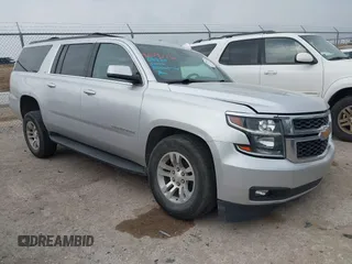 2020 Chevrolet Suburban LT z VIN 1GNSCHKC6LR265468, wystawiony jako IAAI lot #42042772 z przebiegiem 113 335 mil mil oraz . Historia ofert i sprzedaży dostępna na DreamBid. Obrazek 1.