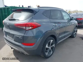 2018 Hyundai Tucson Value with VIN KM8J3CA24JU646807, listed as a IAAI auction lot 41960629 with 117,646 mi miles. Bid and sale history available at carsss.com. Image 4.