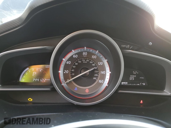 2014 Mazda 3 i Grand Touring with VIN JM1BM1M72E1102296, listed as a Copart auction lot 79222024 with 144,122 mi miles and Salvage Title. Bid and sale history available at DreamBid. Image 9.
