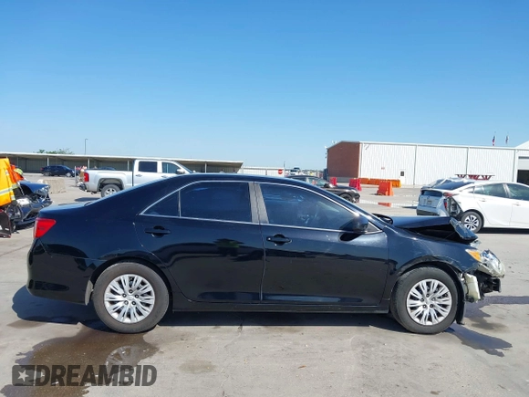 2013 Toyota Camry L with VIN 4T4BF1FK1DR308848, listed as a IAAI auction lot 42014028 with 192,645 mi miles. Bid and sale history available at carsss.com. Image 14.