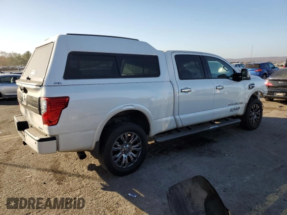 2017 Nissan Titan XD SV with VIN 1N6BA1F4XHN562974, listed as a Copart auction lot 79452174 with 86,414 mi miles and Salvage Title. Bid and sale history available at carsss.com. Image 3.