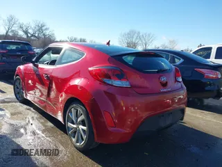2016 Hyundai Veloster z VIN KMHTC6AD1GU260219, wystawiony jako IAAI lot #41114806 z przebiegiem 128 000 mil mil oraz . Historia ofert i sprzedaży dostępna na DreamBid. Obrazek 3.