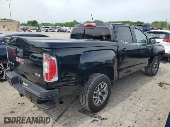 2016 GMC Canyon 4WD SLE with VIN 1GTG6CE31G1317825, listed as a Copart auction lot 53458404 with 102,918 mi miles and Salvage Title. Bid and sale history available at carsss.com. Image 3.