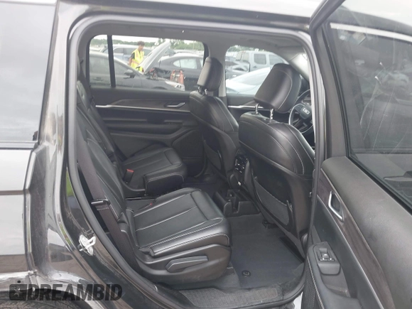 2023 Jeep Grand Cherokee Limited z VIN 1C4RJKBG2P8841694, wystawiony jako IAAI lot #42365314 z przebiegiem 59 987 mil mil oraz . Historia ofert i sprzedaży dostępna na DreamBid. Obrazek 8.