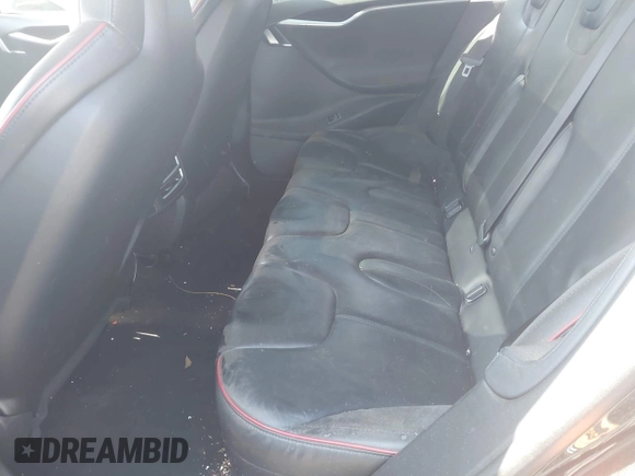 2014 Tesla Model S 60 z VIN 5YJSA1H13EFP42250, wystawiony jako IAAI lot #42267590 z przebiegiem 196 142 mil mil oraz . Historia ofert i sprzedaży dostępna na DreamBid. Obrazek 8.