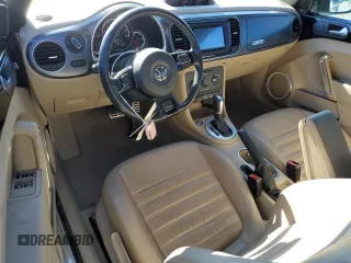 2015 Volkswagen Beetle with VIN 3VW7S7AT1FM818382, listed as a Copart auction lot 41666205 with 47,429 mi miles and Salvage Title. Bid and sale history available at DreamBid. Image 8.