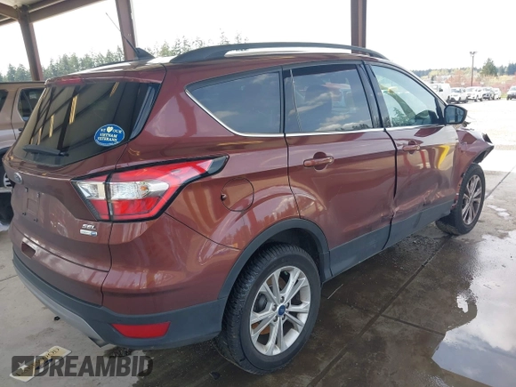 2018 Ford Escape SEL with VIN 1FMCU9HD0JUC36389, listed as a IAAI auction lot 41997627 with 96,739 mi miles. Bid and sale history available at carsss.com. Image 4.