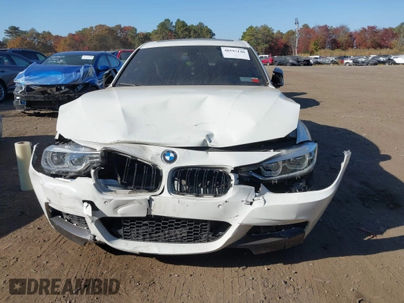 2018 BMW 3 Series 330i xDrive with VIN WBA8D9G55JNU67347, listed as a IAAI auction lot 40597140 with 68,557 mi miles. Bid and sale history available at carsss.com. Image 12.