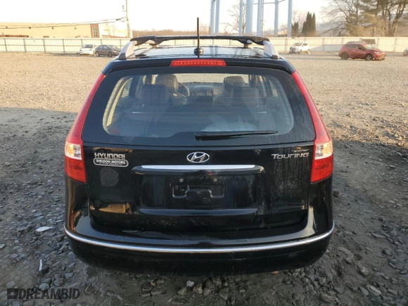 2012 Hyundai Elantra Touring SE with VIN KMHDC8AE0CU137417, listed as a Copart auction lot 47947295 with 141,259 mi miles and Salvage Title. Bid and sale history available at carsss.com. Image 6.