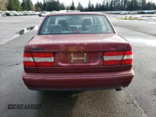 1996 Volvo 960 z VIN YV1KS9603T1085942, wystawiony jako Copart lot #81546584 z przebiegiem 149 865 mil mil oraz Szkody całkowita. Historia ofert i sprzedaży dostępna na DreamBid. Obrazek 6.
