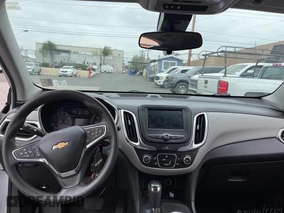 2021 Chevrolet Equinox LS z VIN 3GNAXFEV9MS175201, wystawiony jako IAAI lot #42495755 z przebiegiem 114 474 mil mil oraz . Historia ofert i sprzedaży dostępna na DreamBid. Obrazek 2.