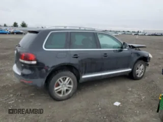 2008 Volkswagen Touareg V6 z VIN WVGLE77L28D026719, wystawiony jako Copart lot #48539225 z przebiegiem Nie podano mil oraz Szkoda całkowita • Salvage title. Historia ofert i sprzedaży dostępna na DreamBid. Obrazek 3.