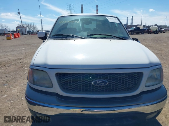 2003 Ford F-150 XLT with VIN 1FTRW07663KD57580, listed as a IAAI auction lot 41870643 with 256,497 mi miles. Bid and sale history available at carsss.com. Image 12.