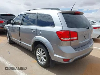 2018 Dodge Journey SXT z VIN 3C4PDCBB0JT361784, wystawiony jako IAAI lot #42172506 z przebiegiem 135 273 mil mil oraz . Historia ofert i sprzedaży dostępna na DreamBid. Obrazek 3.