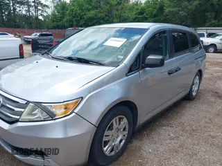 2011 Honda Odyssey LX with VIN 5FNRL5H26BB027144, listed as a IAAI auction lot 42456465 with 201,901 mi miles and . Bid and sale history available at DreamBid. Image 6.