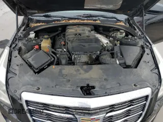 2018 Cadillac ATS RWD z VIN 1G6AA5RX4J0184510, wystawiony jako Copart lot #42934545 z przebiegiem 104 677 mil mil oraz Szkoda całkowita • Salvage title. Historia ofert i sprzedaży dostępna na DreamBid. Obrazek 13.