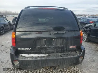 2005 GMC Envoy Denali with VIN 1GKET63M652353972, listed as a Copart auction lot 43690635 with 113,630 mi miles and Clean Title. Bid and sale history available at carsss.com. Image 6.