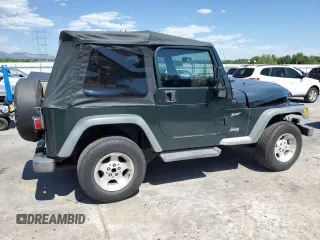 2002 Jeep Wrangler Sport с VIN 1J4FA49SX2P738105, выставлен на аукционе Copart как лот 60320775 с пробегом 402 518 миль миль и Списание • Salvage title. История ставок и продаж доступна на DreamBid. Изображение 3.