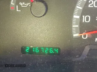 2000 Ford F-150 XL with VIN 1FTZX1729YNC32076, listed as a IAAI auction lot 41523364 with 216,726 mi miles. Bid and sale history available at carsss.com. Image 7.