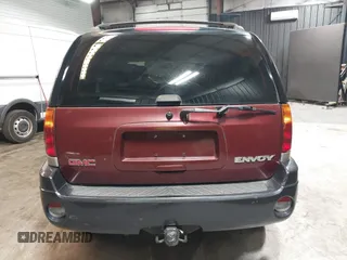 2002 GMC Envoy SLT with VIN 1GKDT13SX22426320, listed as a IAAI auction lot 41709359 with 104,418 mi miles. Bid and sale history available at carsss.com. Image 16.