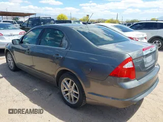 2012 Ford Fusion SEL with VIN 3FAHP0JG6CR307628, listed as a IAAI auction lot 41982612 with 199,602 mi miles. Bid and sale history available at carsss.com. Image 3.