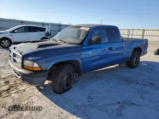 1999 Dodge Dakota SLT with VIN 1B7GL22X5XS321879, listed as a Copart auction lot 84015834 with 210,252 mi miles and Salvage Title. Bid and sale history available at carsss.com. Image 1.