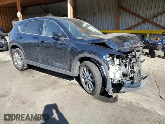2020 Mazda CX-5 Grand Touring with VIN JM3KFBDM3L0786159, listed as a Copart auction lot 48535635 with 87,540 mi miles and Salvage Title. Bid and sale history available at carsss.com. Image 4.